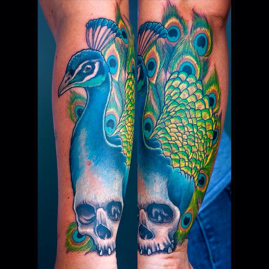 A skull growing out of a peacock? Well, why not...? #tattoo #tattoing #peacock#p...